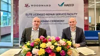 (L-R) Richard Sell, chief executive of HAECO Group and Shawn McLevige, president of Woodward.